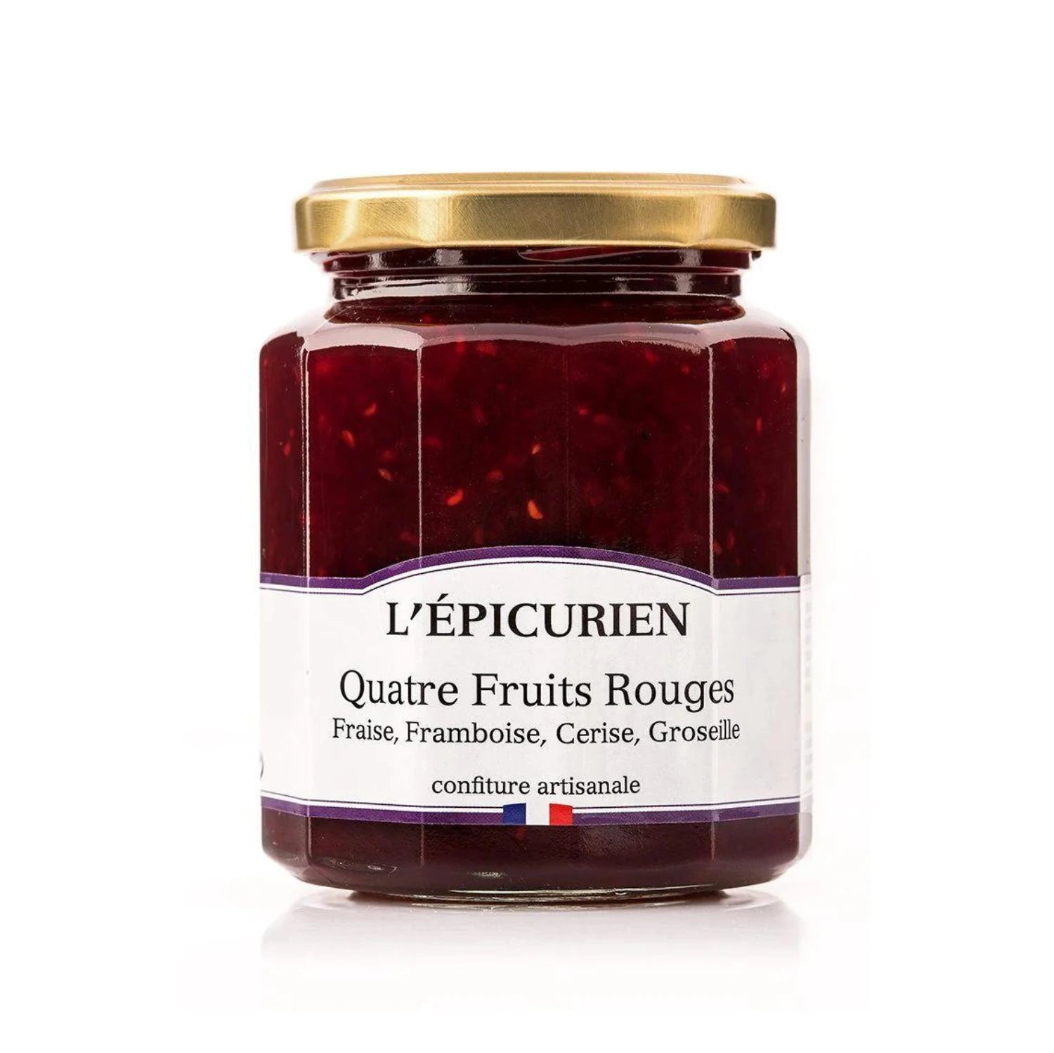 Jar of Artisanal Four Red Berry Jam with visible fruit chunks. Rich ruby-red spread on rustic bread, surrounded by fresh strawberries, raspberries, cherries, and redcurrants.