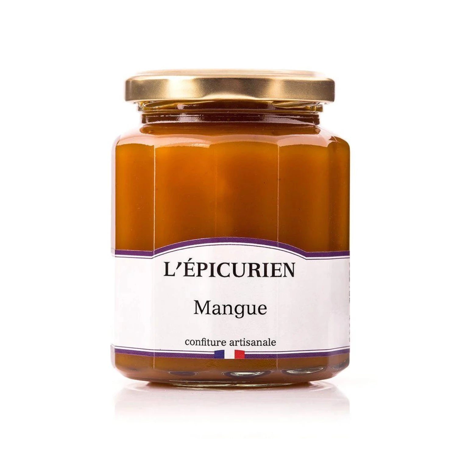 Jar of premium Alphonso Mango Jam with fresh, golden mangoes. Smooth, vibrant spread on artisanal bread and tropical fruit platter.