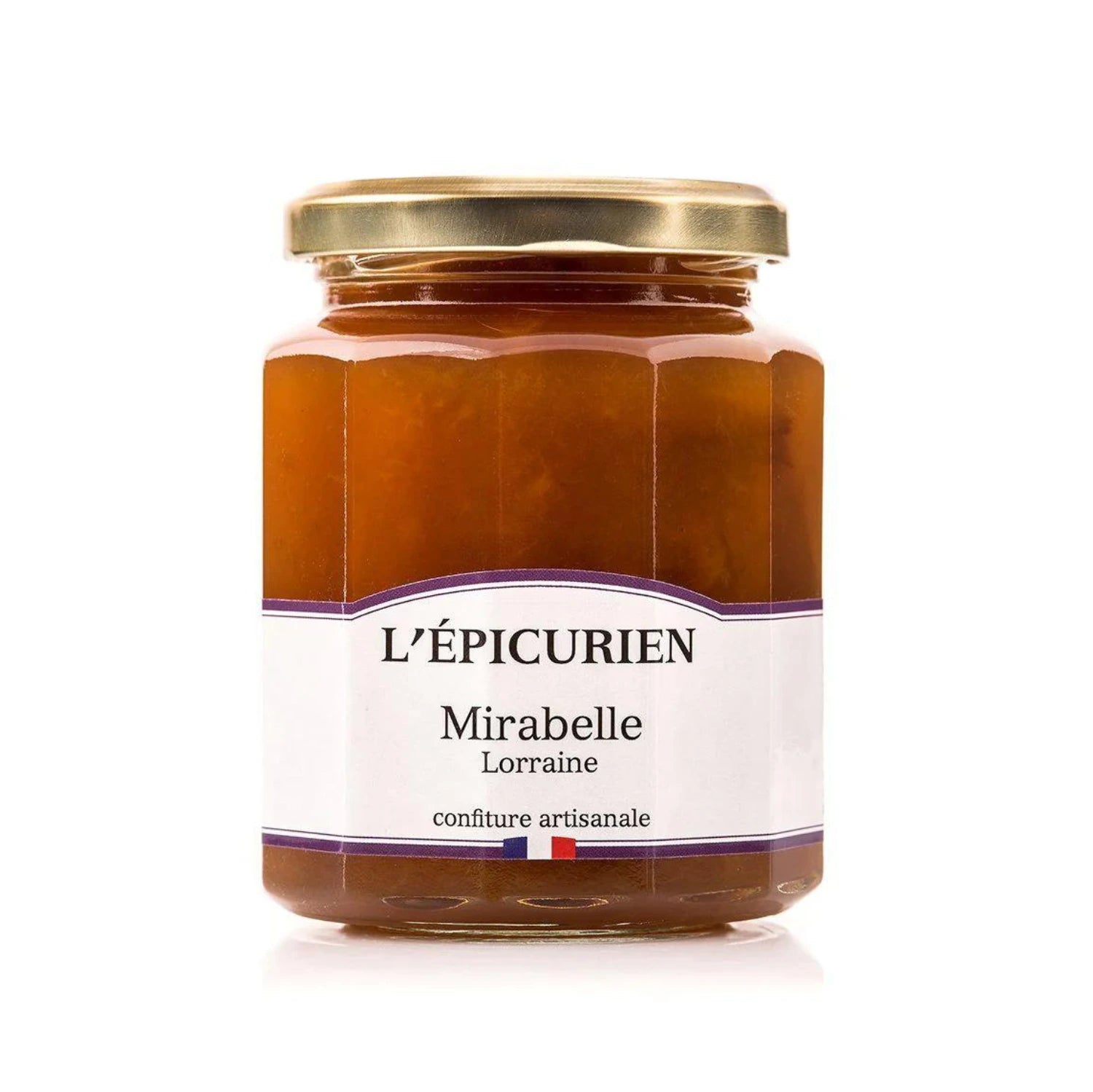 Jar of artisanal Mirabelle Plum Jam with fresh golden-yellow plums. Smooth, slightly chunky spread on croissant and artisan bread.