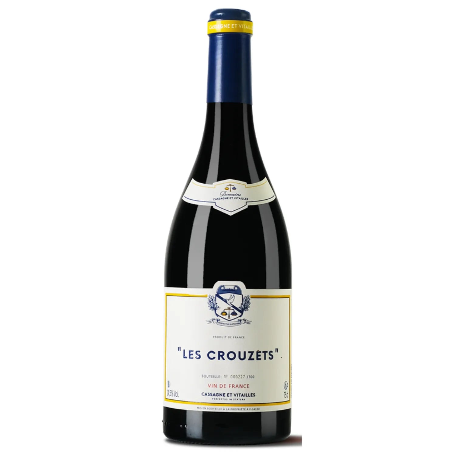 A bottle of Les Crouzets 2021 from Domaine Cassagne et Vitailles, showcasing a deep garnet color. This wine from the Languedoc region is primarily made from Grenache and aged to bring out rich and complex aromas. It features a bouquet with notes of ripe red berries, plums, and spices. The palate is well-balanced and structured, offering flavors of rich fruit, hints of licorice, and a subtle oak finish.