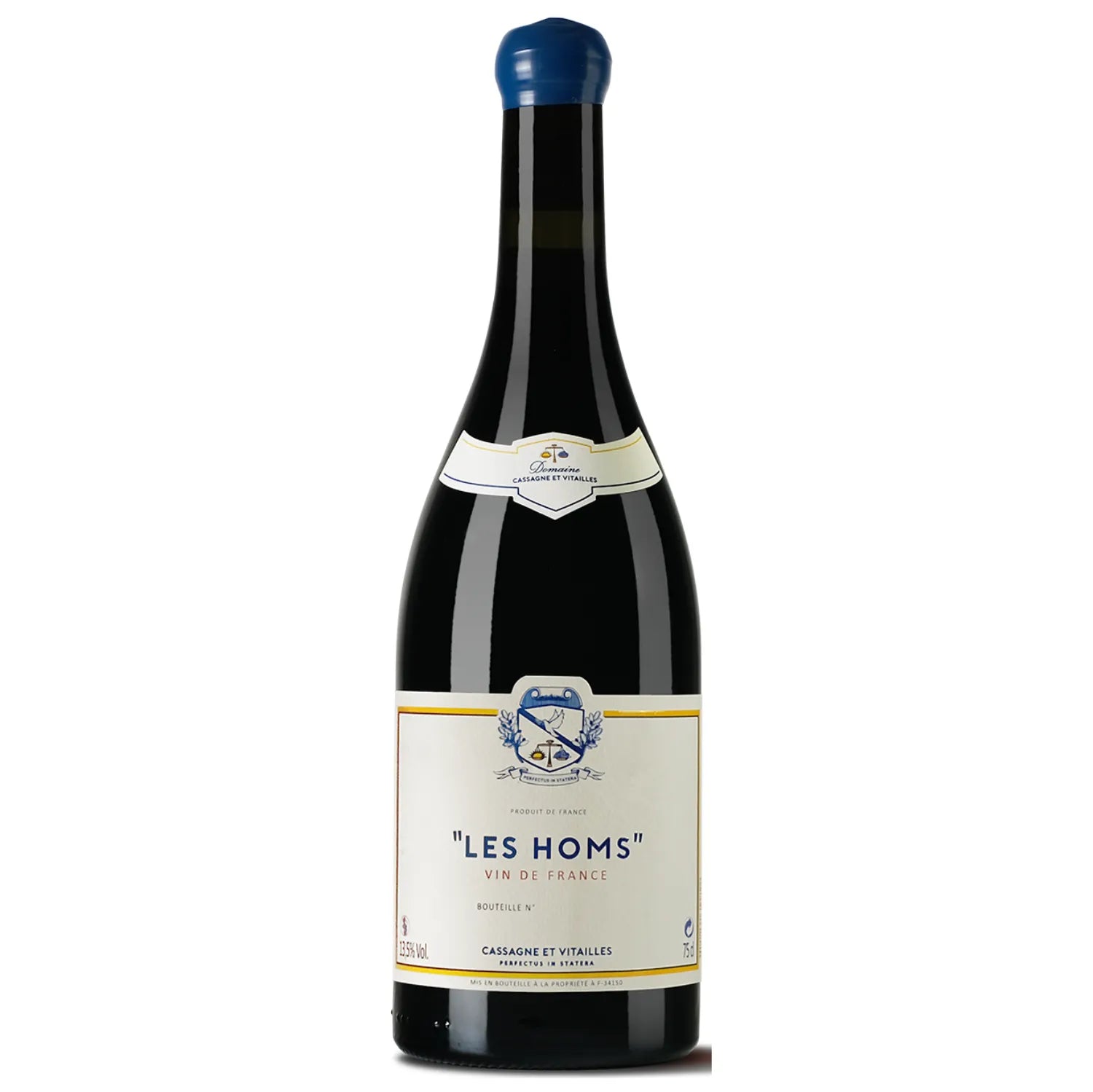 A bottle of Les Homs 2021 from Domaine Cassagne et Vitailles, showcasing a deep garnet color. This wine from the Vin de France appellation is crafted from a proprietary blend, expressing the unique terroir of the Languedoc region. It features a bouquet with notes of pepper, spice, raspberry, cherry, plum, and leather.