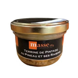 Gourmet guinea fowl terrine with grapes and Pineau des Charentes. Served on crispy toasted bread with fresh salad and homemade chutney. Delightful contrast of textures. Perfect for an elegant appetizer or light gourmet meal.