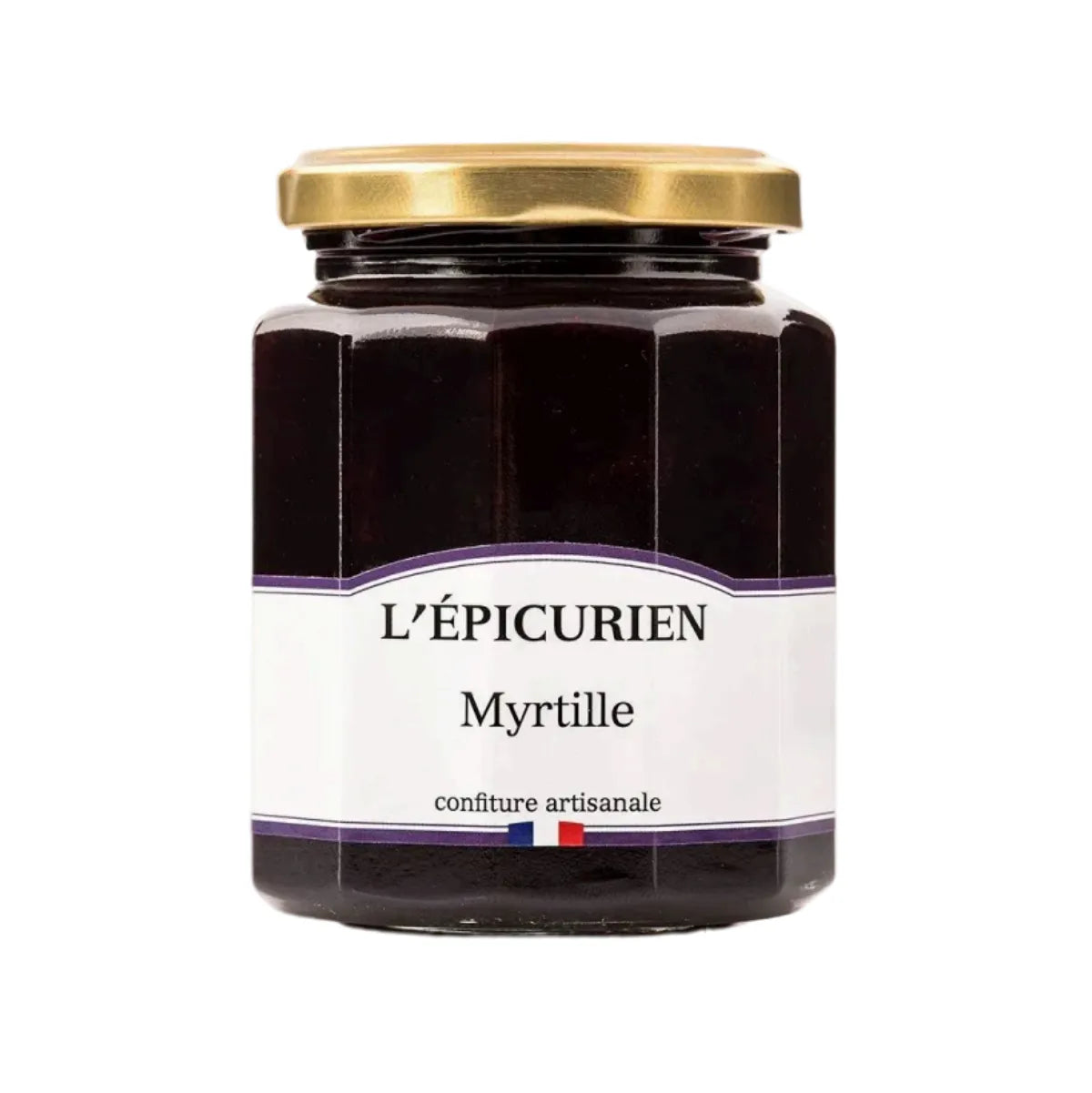 Jar of artisanal Wild Blueberry Jam with whole berries visible. Rich, deep purple spread on rustic bread, alongside fresh blueberries and a gourmet cheese selection.