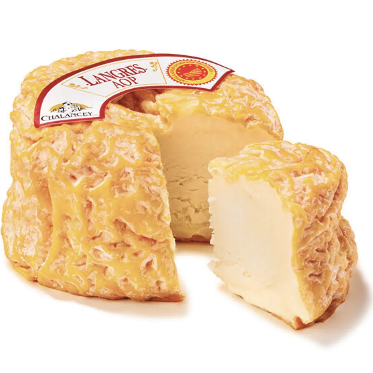 Langres AOP cheese with its signature sunken top, creamy orange rind, and rich, washed-rind texture — a traditional French cow’s milk cheese from Champagne.