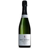 The aging process of the Marc Hebrart Selection Extra Brut Premier Cru NV involves a blend of 70% Pinot Noir and 30% Chardonnay from Premier Cru Mareuil-sur-Ay. The base wine is a blend of 55% 2018, 25% 2017, and 20% 2016, with 30 months of aging on lees. The dosage is 6 grams per liter. This process allows the wine to develop a rich and full-bodied taste profile with a complex and soil-driven character.