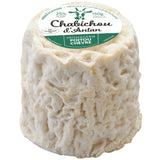 Close-up of Chabichou du Poitou, a creamy artisanal goat cheese with a bloomy rind and conical shape, ideal for cheese boards.
