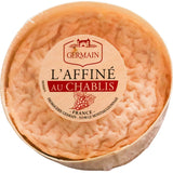 Affine au Chablis cheese, washed in Chablis wine, reveals a creamy texture with rich, tangy flavors. Perfect for gourmet cheese boards and wine pairings