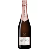 Bottle of Le Noble V.19 Rosé Champagne, delicate salmon-pink color with fine bubbles, elegant label, showcasing French craftsmanship.