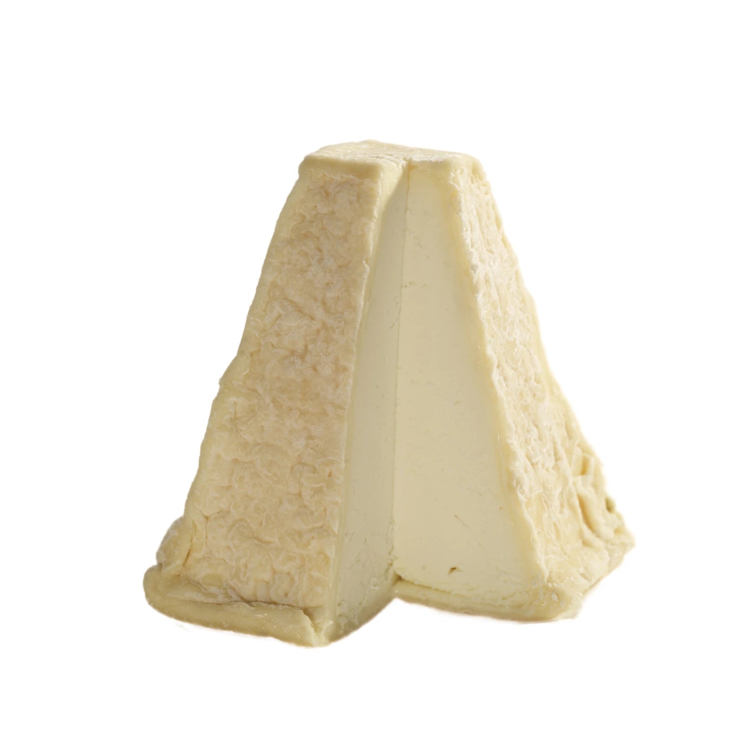 Pouligny-Saint-Pierre has a square base measuring approximately 6.5 cm wide and stands about 9 cm tall. The exterior is a golden brown, speckled with grey-blue mould, while the interior features a bright white, smooth, and crumbly texture.