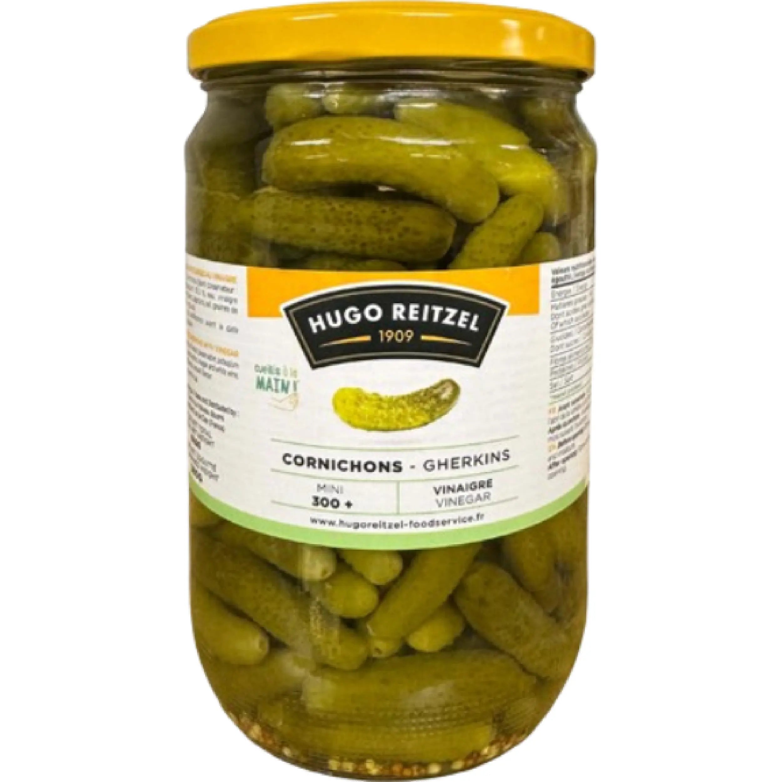 Jar of Cornichons Hugo Reitzel 72cl, crunchy pickled gherkins in vinegar brine, classic gourmet condiment for charcuterie and sandwiches.