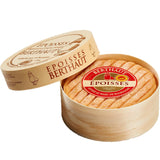 Époisses Berthaut, cheesemonger’s selection: cow’s milk cheese washed with Burgundy marc, featuring an orange rind, creamy texture, and strong flavour, presented in its traditional wooden box. Fromage au lait de vache affiné au marc de Bourgogne, croûte lavée orangée, texture fondante et goût puissant, présenté dans sa boîte en bois traditionnelle.