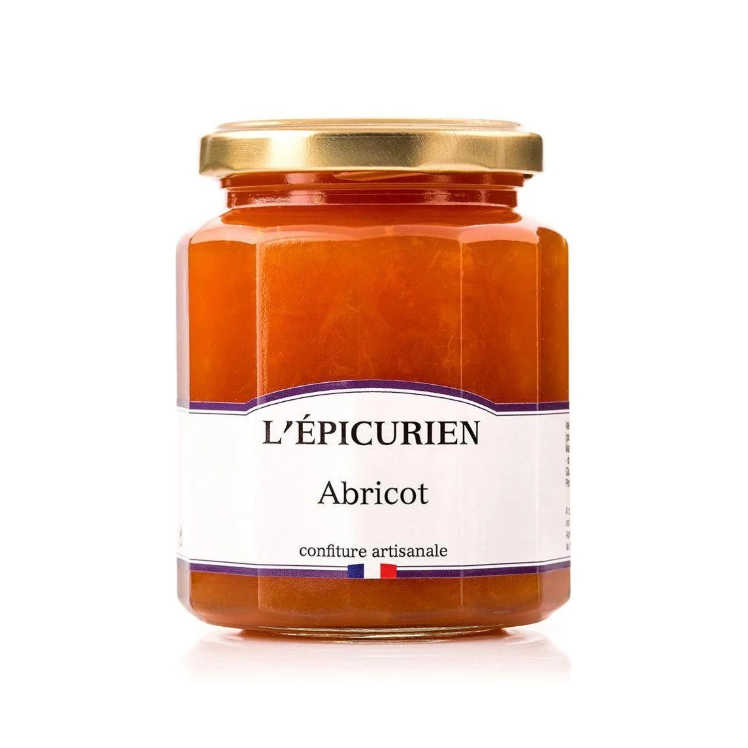 Jar of L'Épicurien's Artisanal Apricot Jam with rich, orange-colored spread on rustic bread. Fresh Roussillon apricots nearby.