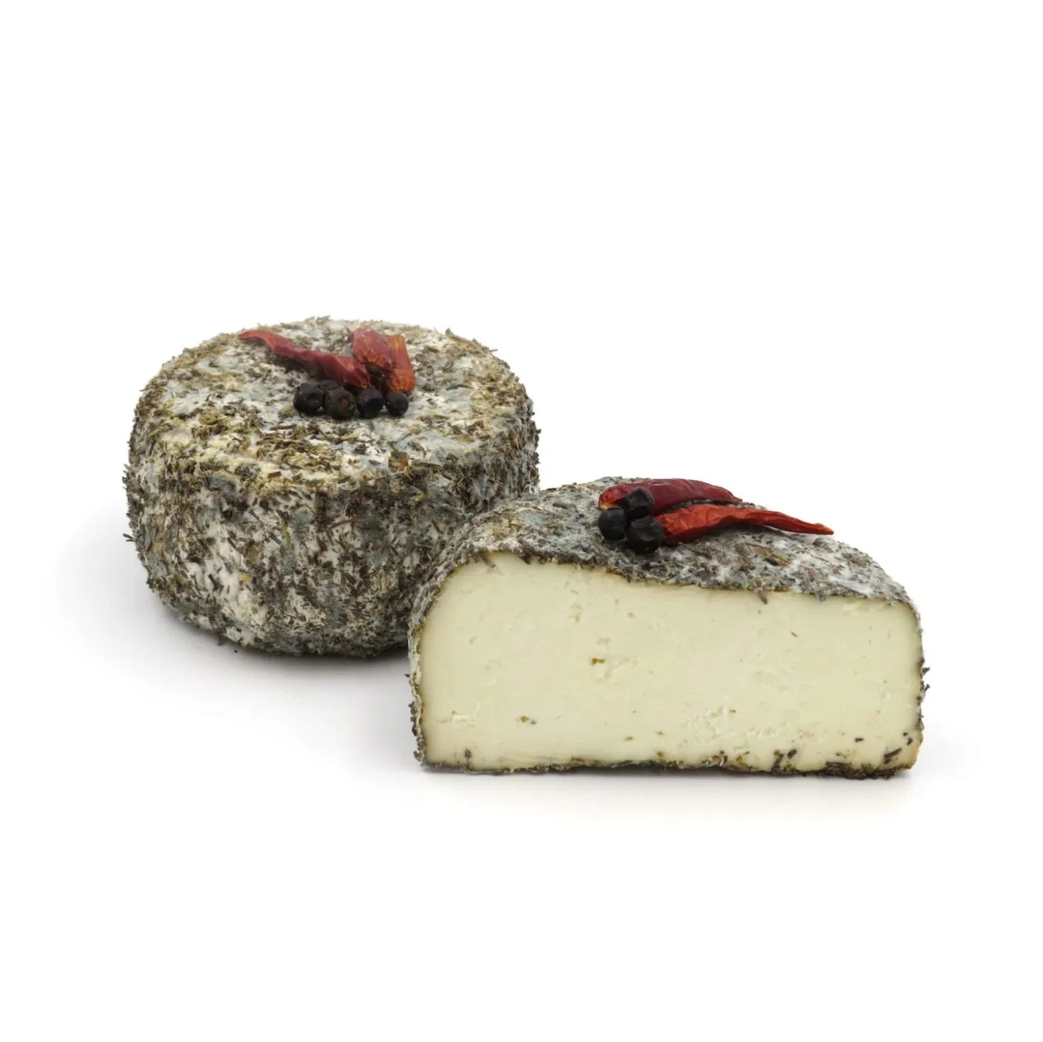 Maquis de Corse cheese, a rustic and aromatic ewe's milk cheese from Corsica, with a rind encrusted with wild herbs such as thyme, rosemary, and oregano. It features a creamy, tangy interior that reflects the rich flavors of the Corsican countryside. The cheese is known for its unique texture and robust, herbaceous aroma.