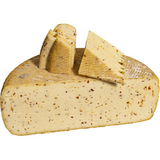 Chili Pepper Raclette Cheese from Savoie IGP, 1Kg – raw milk raclette with a creamy texture and mild spicy flavor.