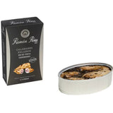 Delicate baby squid (chipirones) stuffed and slow-cooked in their own rich ink sauce for an intense, authentic flavor. A culinary treasure from Galicia, perfect for lovers of traditional Spanish seafood.