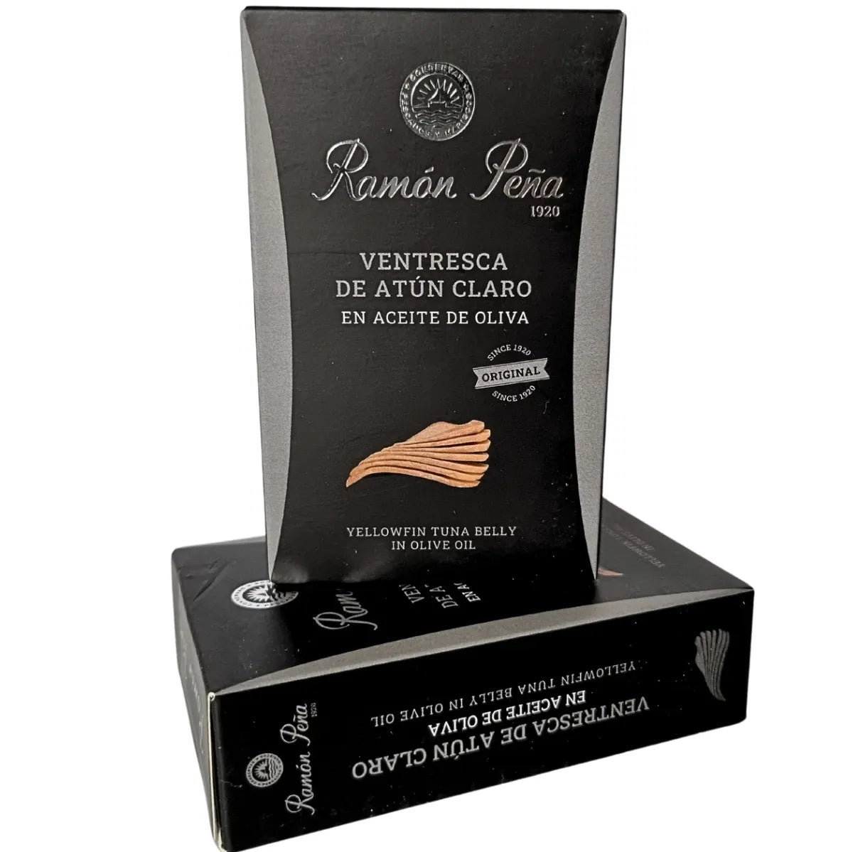 Exquisite white tuna belly (ventresca) preserved in premium olive oil, offering an exceptionally tender texture and rich, delicate flavor. A gourmet delicacy from the sea, perfect for refined tapas or elegant salads.