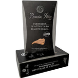 Exquisite white tuna belly (ventresca) preserved in premium olive oil, offering an exceptionally tender texture and rich, delicate flavor. A gourmet delicacy from the sea, perfect for refined tapas or elegant salads.