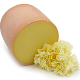 Tête de Moine AOP Swiss cheese wheel ~900g, traditionally shaved into rosettes with a girolle, offering creamy, nutty and tangy flavors.