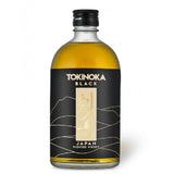Bottle of Tokinoka Black Japan Blended Whisky with a black label featuring golden mountain outlines.