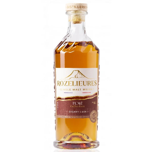 Bottle of Rozelieures Fumé Collection whisky, with a black and gold label, containing a dark amber liquid.