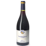 A bottle of Combarels à La Lumière 2021 from Domaine Cassagne et Vitailles, showcasing a vibrant golden color. This wine from the Terrasses du Larzac region is crafted from a proprietary blend of Chardonnay, Grenache, and Viognier, expressing the unique terroir of Languedoc. 