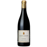 A bottle of Saint-Joseph "Les Serines" 2021 from Domaine Yves Cuilleron, featuring its organic label and deep red color, highlighting the elegance and heritage of this Rhône Valley Syrah.